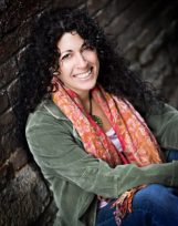 mel-author-photo-brick-393x500